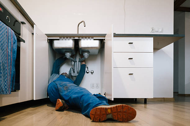 Professional Emergency Plumber technician working in Telford, PA
